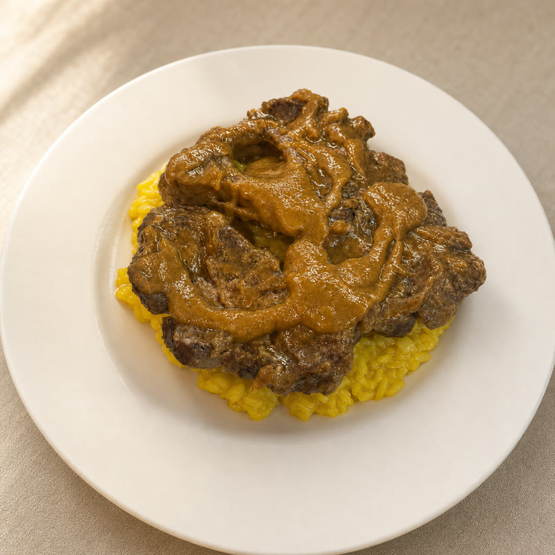 Ossobuco su risotto allo zafferano